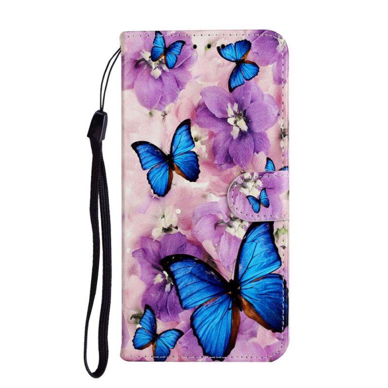 Leren Hoesje voor Huawei Y6p Blauwe Vlinders In De Bloemen