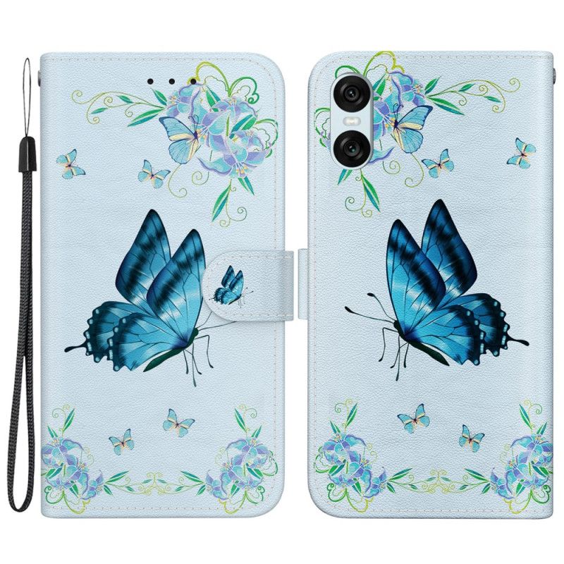 Leren Hoesje Sony Xperia 10 Vi Blauwe Vlinder En Bloemen Met Riempje