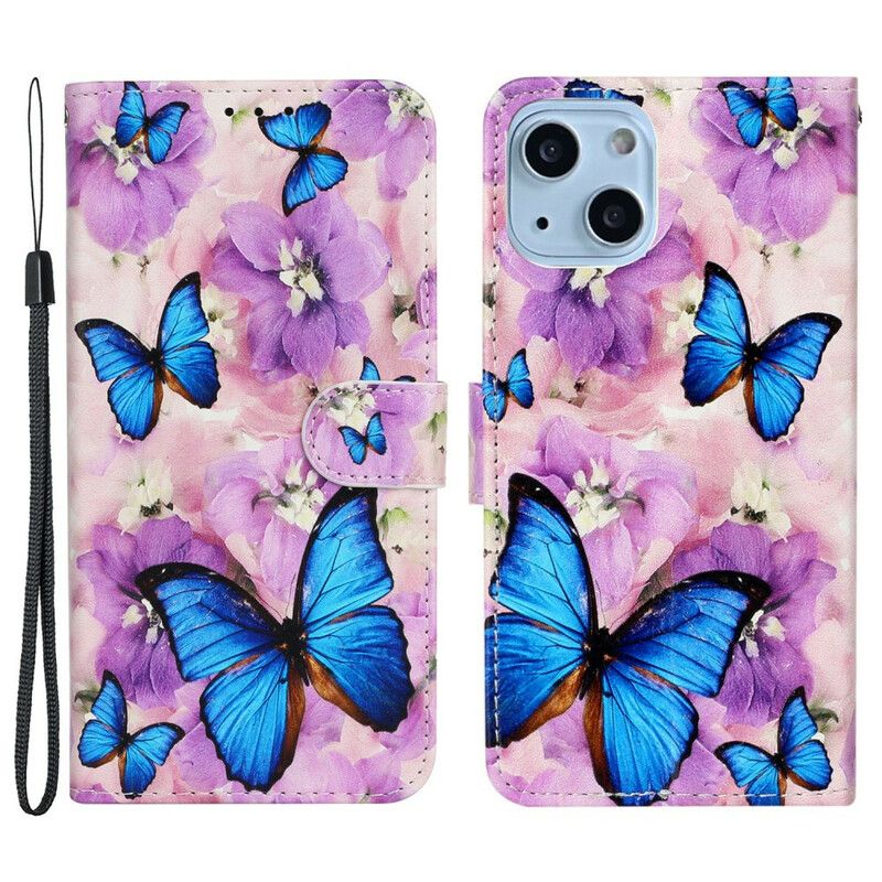 Folio-hoesje iPhone 13 Mini Blauwe Vlinders In De Bloemen