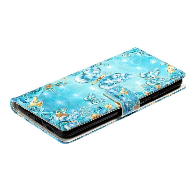 Leren Hoesje Samsung Galaxy S20 Ultra Telefoonhoesje Vlinders En Bloemen Op Een Blauwe Achtergrond