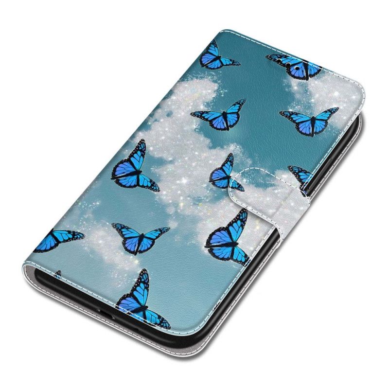 Leren Hoesje Samsung Galaxy S24 5g Witte Wolken En Blauwe Vlinders Met Riem Bescherming Hoesje