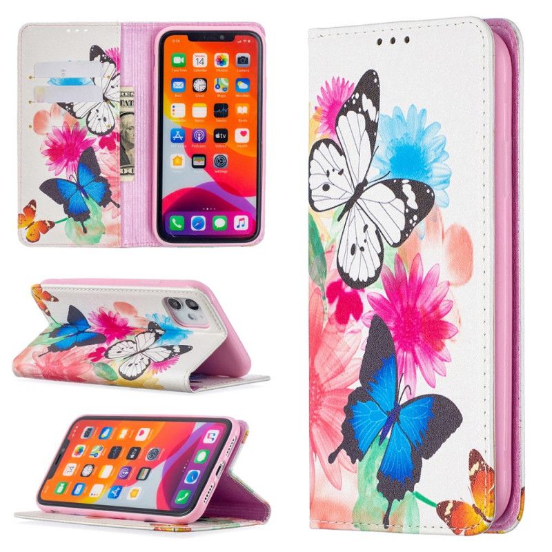 Folio-hoesje iPhone 11 Lichtblauw Wit Telefoonhoesje Kleurrijke Vlinders