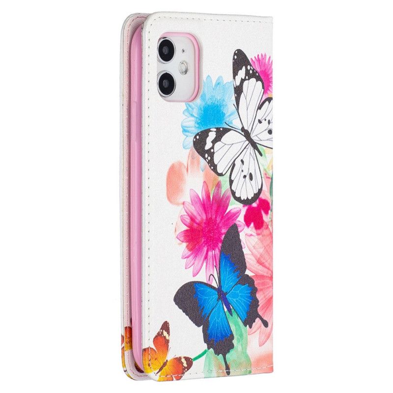 Folio-hoesje iPhone 11 Lichtblauw Wit Telefoonhoesje Kleurrijke Vlinders