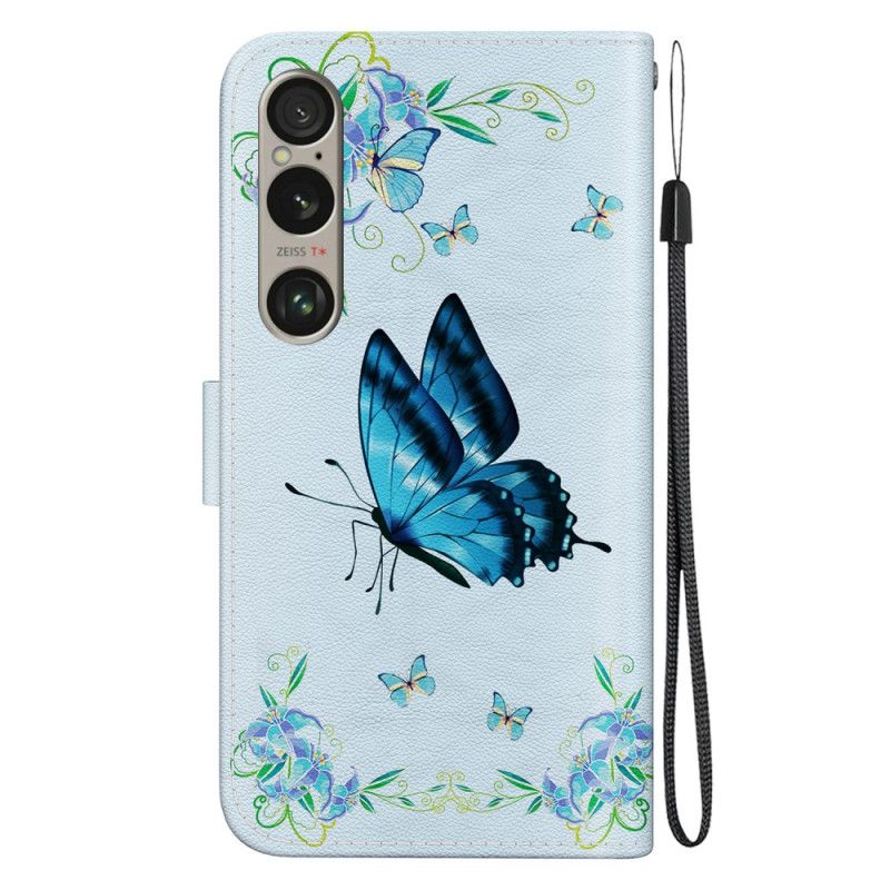 Folio-hoesje Sony Xperia 1 Vi Blauwe Vlinder En Bloemen Met Riempje