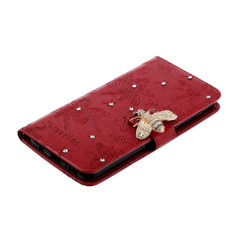 Cover Folio-hoesje Samsung Galaxy A20s Goud Rood Telefoonhoesje Glimlach Bijen Charme